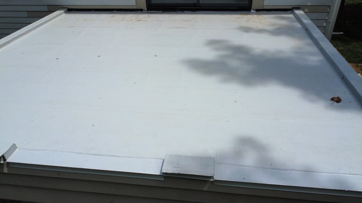 Roofing project in progress in Charlotte, NC - roofing crew working on residential roof replacement by Best Roofing Now Roofing project in progress in Charlotte, NC - roofing crew working on residential roof replacement by Best Roofing Now