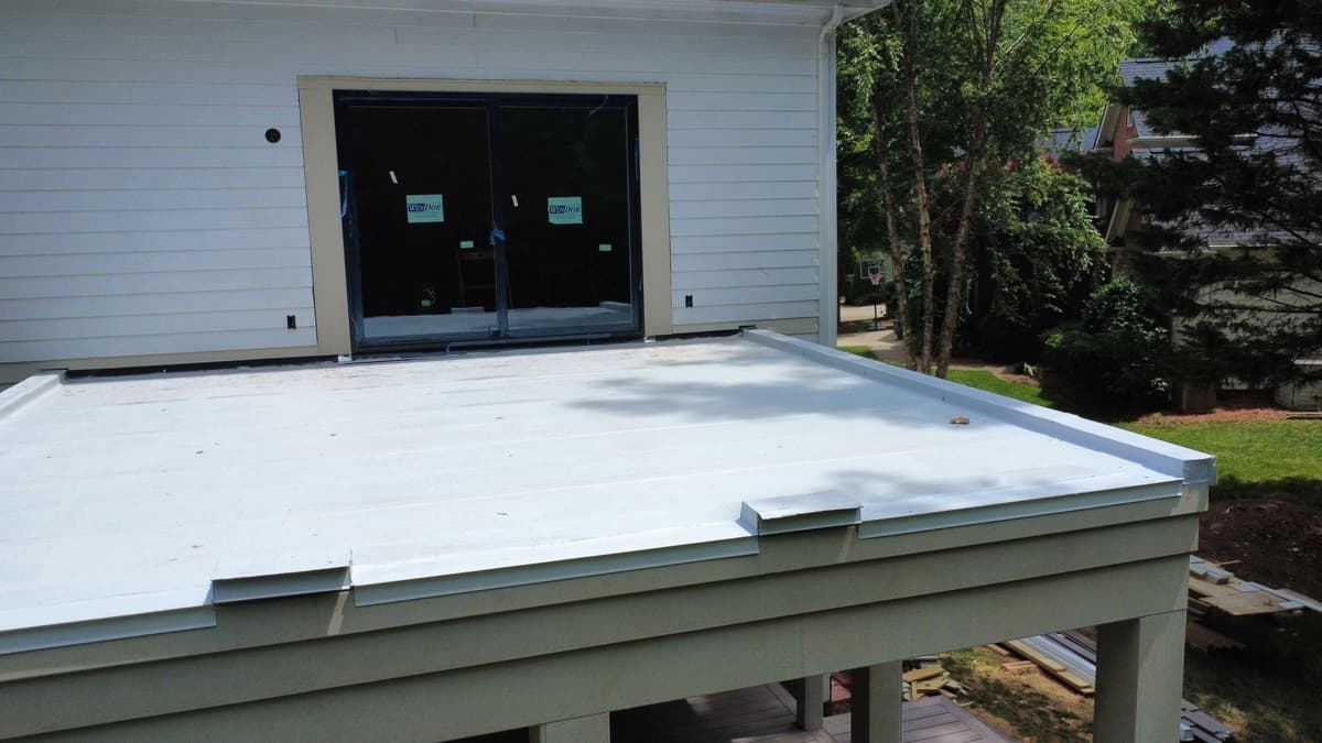 Completed roofing project in Charlotte, NC - contemporary home with new roofing system installed by Best Roofing Now Completed roofing project in Charlotte, NC - contemporary home with new roofing system installed by Best Roofing Now