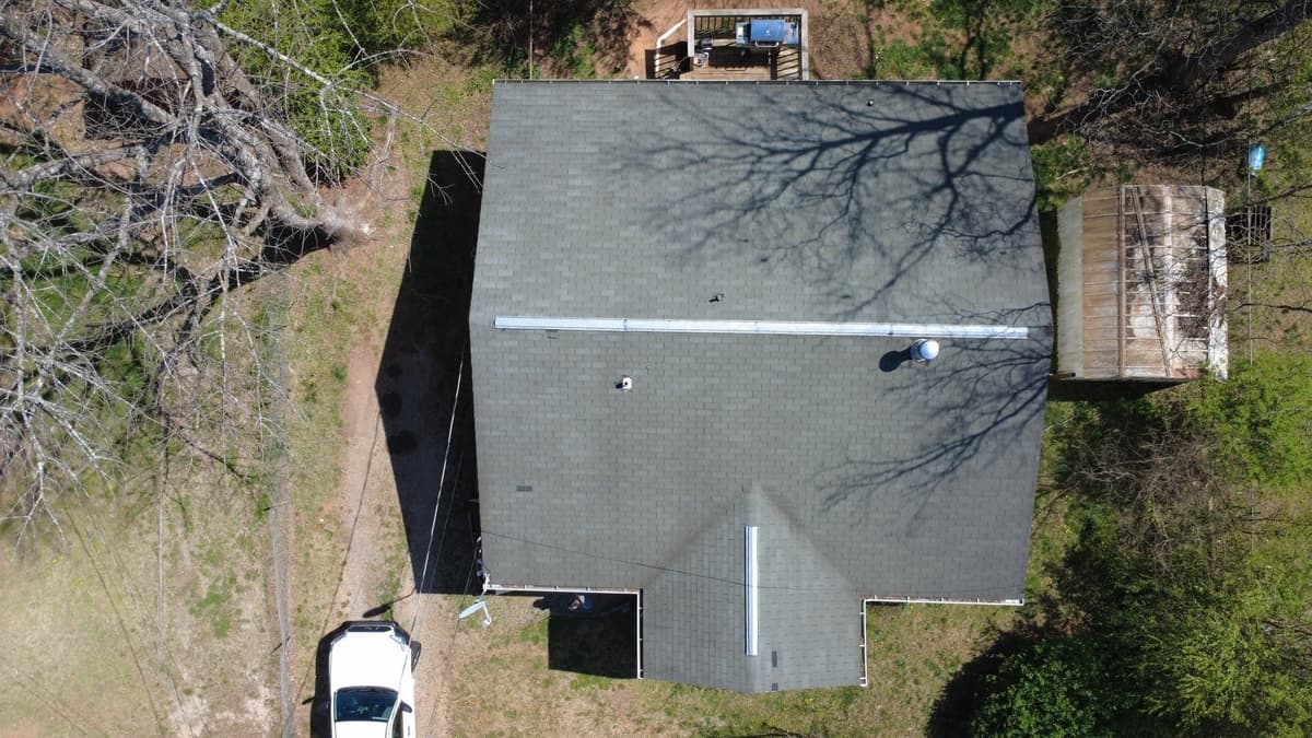 Charlotte roofing professional inspecting attic ventilation Charlotte roofing professional inspecting attic ventilation